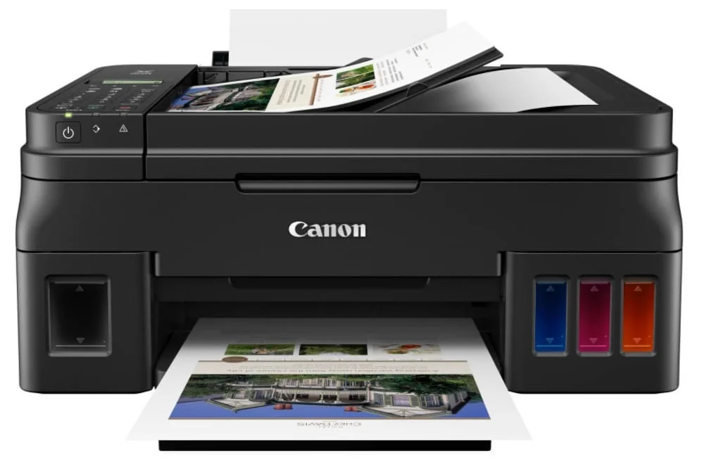 Técnico realizando mantenimiento de impresora Canon G3110 a domicilio en Usaquén Bogotá